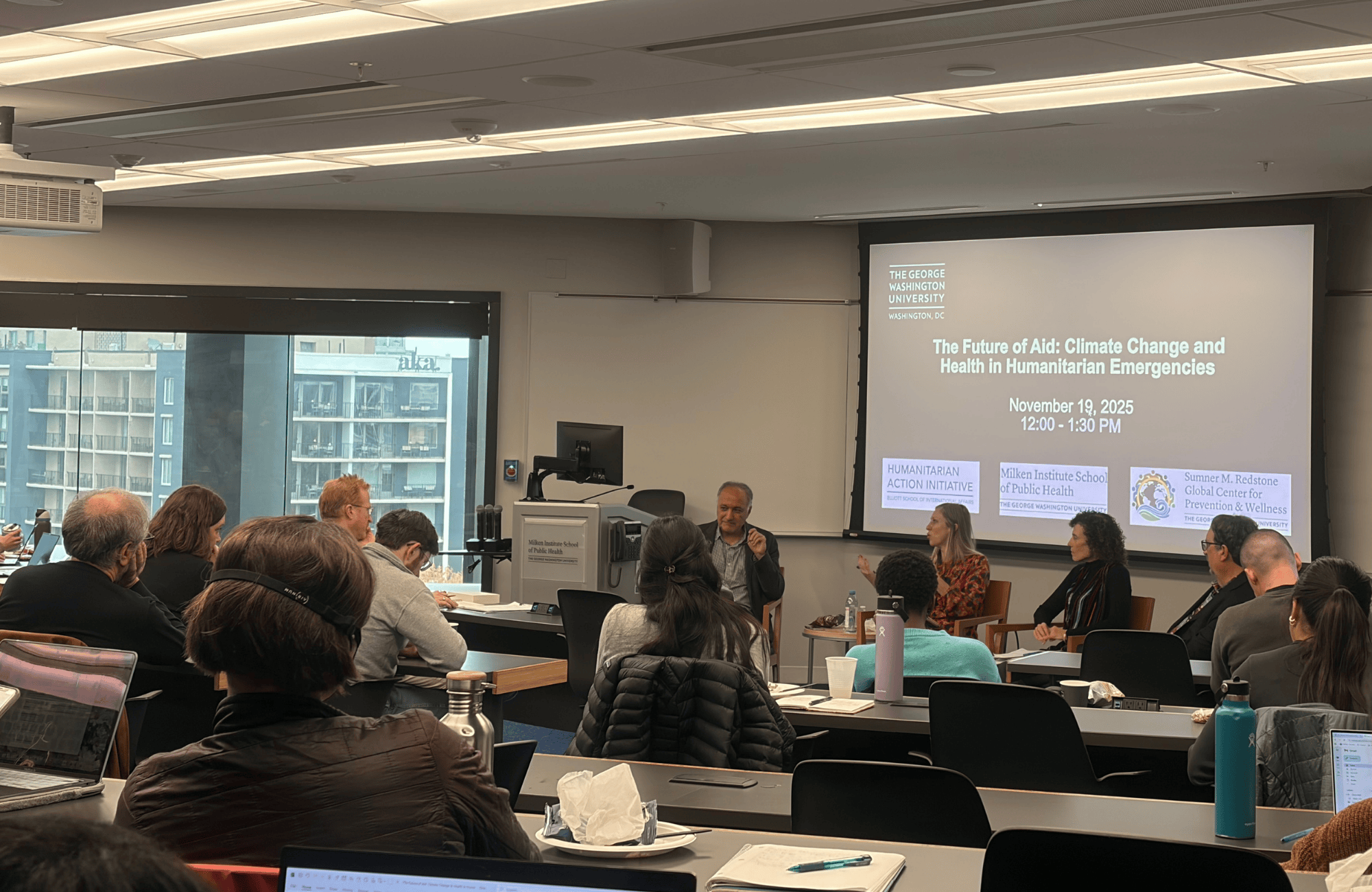 Image of case study room with panelists and audience